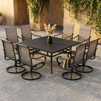 Black 9-Piece Metal Patio Outdoor Dining Set with Slat Square Table and Textilene Swivel Chairs — Studio Shot